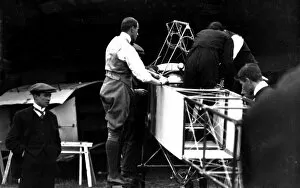 Pre 1914 Collection: Claude Grahame-White overseeing the erection of Bleriot monoplane