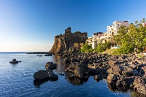 Aci Castello, Sicily. Norman castle on the sea in the morning Aci Castello, Sicily. Norman castle on the sea in the morning