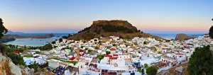 Acropolis of Lindos & village illuminated at dusk, Lindos, Rhodes, Greece Acropolis of Lindos & village illuminated at dusk, Lindos, Rhodes, Greece