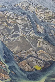 Aerial of river estuary water coloured by glacial melt, Iceland Aerial of river estuary water coloured by glacial melt, Iceland