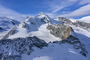 Aerial view on Allalinhorn and Strahlhorn, Mischabel mountain range, Saas Fee, Valais Aerial view on Allalinhorn and Strahlhorn, Mischabel mountain range, Saas Fee, Valais