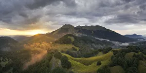 Aerial view of Alto Mountain at sunset in summer day, municipality of Fivizzano Aerial view of Alto Mountain at sunset in summer day, municipality of Fivizzano