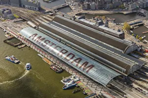 Aerial view of Amsterdam with Amsterdam Central Railway station, Netherlands Aerial view of Amsterdam with Amsterdam Central Railway station, Netherlands