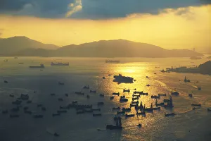 Aerial view of cargo ships with Lantau Island in the background, Hong Kong, China Aerial view of cargo ships with Lantau Island in the background, Hong Kong, China