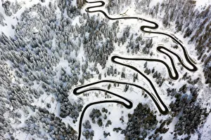 Aerial view of curves of the Maloja pass after a snowfall, Maloja Pass, Bregaglia Valley Aerial view of curves of the Maloja pass after a snowfall, Maloja Pass, Bregaglia Valley