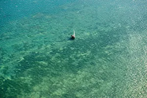 Aerial view of dhow in indian ocean, near Kilwa, east Coast Tanzania Aerial view of dhow in indian ocean, near Kilwa, east Coast Tanzania