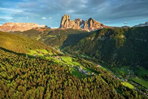Rock Face Collection: Aerial view of Sassolungo group, Sassopiatto, Gardena Valley and at sunset in spring, Dolomites