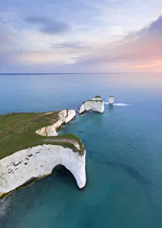 Aerial view at sunrise of the Old Harry Rocks, chalky formations near Handfast Point Aerial view at sunrise of the Old Harry Rocks, chalky formations near Handfast Point
