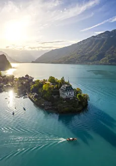 Aerial view of the village of Iseltwald and its peninsula with the old Castle during Aerial view of the village of Iseltwald and its peninsula with the old Castle during