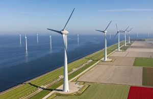 Aerial view of wind turbines at sea, North Holland, Netherlands Aerial view of wind turbines at sea, North Holland, Netherlands