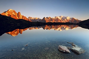 Alpine lake with Mount Blanc massif in the sunset, Chamonix Alpine lake with Mount Blanc massif in the sunset, Chamonix