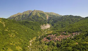 The Alto Mountain and little town of Sassalbo insummer day, municipality of Fivizzano The Alto Mountain and little town of Sassalbo insummer day, municipality of Fivizzano