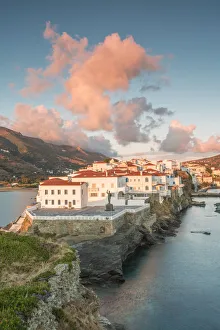 Andros village at sunrise viewed from an old ruined castle, Andros, Cyclades Archipelago Andros village at sunrise viewed from an old ruined castle, Andros, Cyclades Archipelago