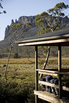 Backpacks lined up on the balcony of New Pelion Hut on the Overland Track Backpacks lined up on the balcony of New Pelion Hut on the Overland Track