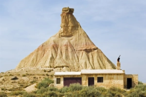 The Bardena Blanca rock outcrop and stone house The Bardena Blanca rock outcrop and stone house