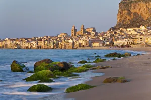 Beach at sunset, Cefalu, N coast, Sicily Beach at sunset, Cefalu, N coast, Sicily
