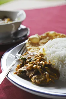 Beef curry, rice and papadom, Negombo, Sri Lanka Beef curry, rice and papadom, Negombo, Sri Lanka