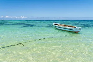 Empty boat moored in the turquoise sea, Poste Lafayette, Indian Ocean, East coast Empty boat moored in the turquoise sea, Poste Lafayette, Indian Ocean, East coast
