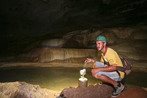 Brazil, Bahia, Chapada Diamantina, a guide in the Gruta da Lapa Doce caves in the Brazil, Bahia, Chapada Diamantina, a guide in the Gruta da Lapa Doce caves in the