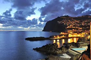 Camara de Lobos and Girao Cape at sunset. Madeira, Portugal Camara de Lobos and Girao Cape at sunset. Madeira, Portugal