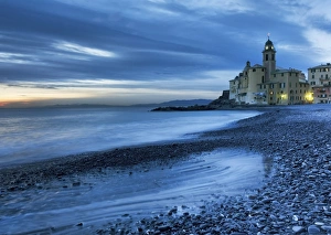 Camogli, Genoa, Ligurian, Italy, Europe. The last lights of the evening over Camogli town Camogli, Genoa, Ligurian, Italy, Europe. The last lights of the evening over Camogli town