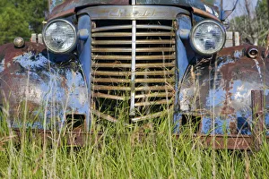 Canada. An old car in a farmers field on the Canadian Prairie Canada. An old car in a farmers field on the Canadian Prairie