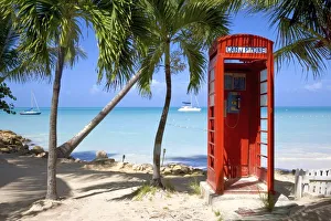 Caribbean, Antigua, Dickenson Bay, English red telephone box Caribbean, Antigua, Dickenson Bay, English red telephone box