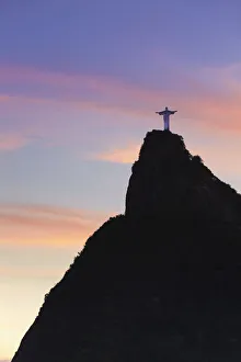 Christ the Redeemer statue (Cristo Redentor) at sunset, Corcovado, Rio de Janeiro, Brazil Christ the Redeemer statue (Cristo Redentor) at sunset, Corcovado, Rio de Janeiro, Brazil