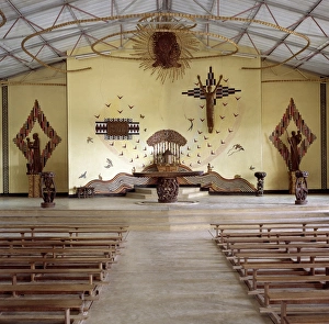 The church of the Catholic mission at Mua combines The church of the Catholic mission at Mua combines