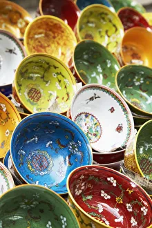 Colourful Chinese bowls on market stall on Upper Lascar Row (Cat Street), Central Colourful Chinese bowls on market stall on Upper Lascar Row (Cat Street), Central