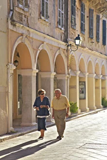 Images Dated 27th October 2015: Couple Walking Through Corfu Old Town, Corfu, The Ionian Islands, Greek Islands, Greece