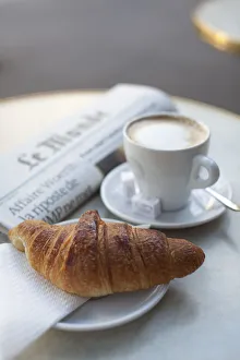 Croissant and coffee in a cafe, Paris, France Croissant and coffee in a cafe, Paris, France