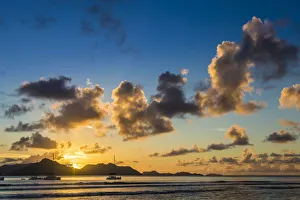 Cumulus cloads at sunset, La Digue, Seychelles Cumulus cloads at sunset, La Digue, Seychelles