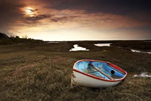 Dinghy at Sunset, Brancaster, Norfolk, England Dinghy at Sunset, Brancaster, Norfolk, England