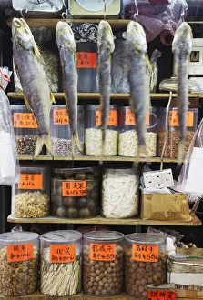 Dried fish hanging up at dried seafood stall, Des Voeux Road West, Sheung Wan, Hong Kong Dried fish hanging up at dried seafood stall, Des Voeux Road West, Sheung Wan, Hong Kong