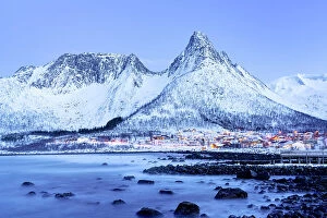 Q3 2023 Collection: Dusk over Mefjordvaer village covered with snow in winter, Senja, Troms county, Norway