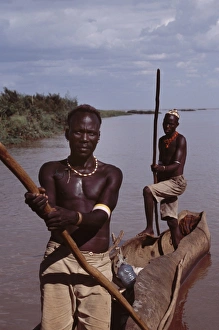 El Molo fishermen in their dugout canoe on the fringe El Molo fishermen in their dugout canoe on the fringe