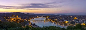 Hungary Collection: Elevated view over Budapest & the River Danube illuminated at sunset, Budapest