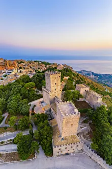 Erice, Sicily. Aerial of the Norman castle at sunrise, view towards Trapani Erice, Sicily. Aerial of the Norman castle at sunrise, view towards Trapani
