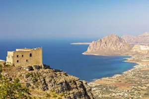 Erice, Sicily. View of the spanish quarter and Monte Cofano in the background Erice, Sicily. View of the spanish quarter and Monte Cofano in the background