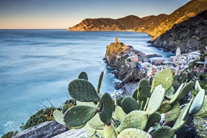 The first light of dawn on the famous tower of the village of Vernazza. Cinque Terre National Park The first light of dawn on the famous tower of the village of Vernazza. Cinque Terre National Park