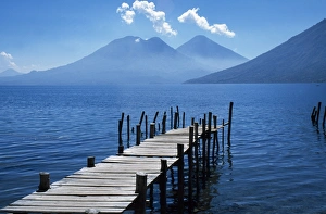 Fishing jetty on Lake Atitlan with volcanoes Toliman and Atitlan behind Fishing jetty on Lake Atitlan with volcanoes Toliman and Atitlan behind