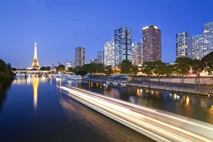 France, Paris, Night View Of River Seine With High-rise Buildings On The Left Bank France, Paris, Night View Of River Seine With High-rise Buildings On The Left Bank