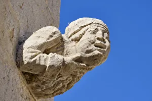 Gargoyle on the cloisters of the 15th century Convento de Jesus (Jesus Convent Gargoyle on the cloisters of the 15th century Convento de Jesus (Jesus Convent