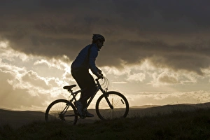 Gilar Farm, Snowdonia, North Wales. Man mountain biking. (MR) Gilar Farm, Snowdonia, North Wales. Man mountain biking. (MR)