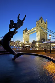 Girl and Dolphin and Tower Bridge, London, England Girl and Dolphin and Tower Bridge, London, England