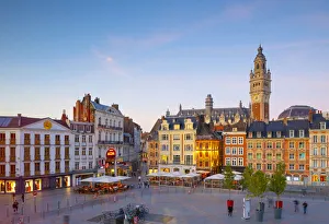 The Grand Place and Lille Chamber of Commerce Belfry at Dusk, Lille, France The Grand Place and Lille Chamber of Commerce Belfry at Dusk, Lille, France