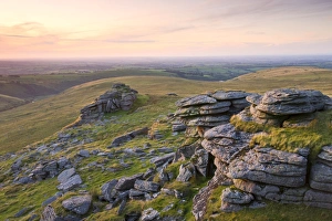 Granite outcrops at Black Tor on a summer evening, Dartmoor National Park, Devon, England Granite outcrops at Black Tor on a summer evening, Dartmoor National Park, Devon, England