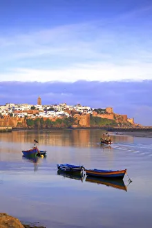 Harbour and Fishing Boats with Oudaia Kasbah and Coastline in Background, Rabat, Morocco Harbour and Fishing Boats with Oudaia Kasbah and Coastline in Background, Rabat, Morocco