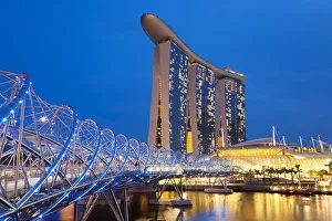 Helix bridge & Marina Bay Sands Hotel at dusk, Singapore Helix bridge & Marina Bay Sands Hotel at dusk, Singapore